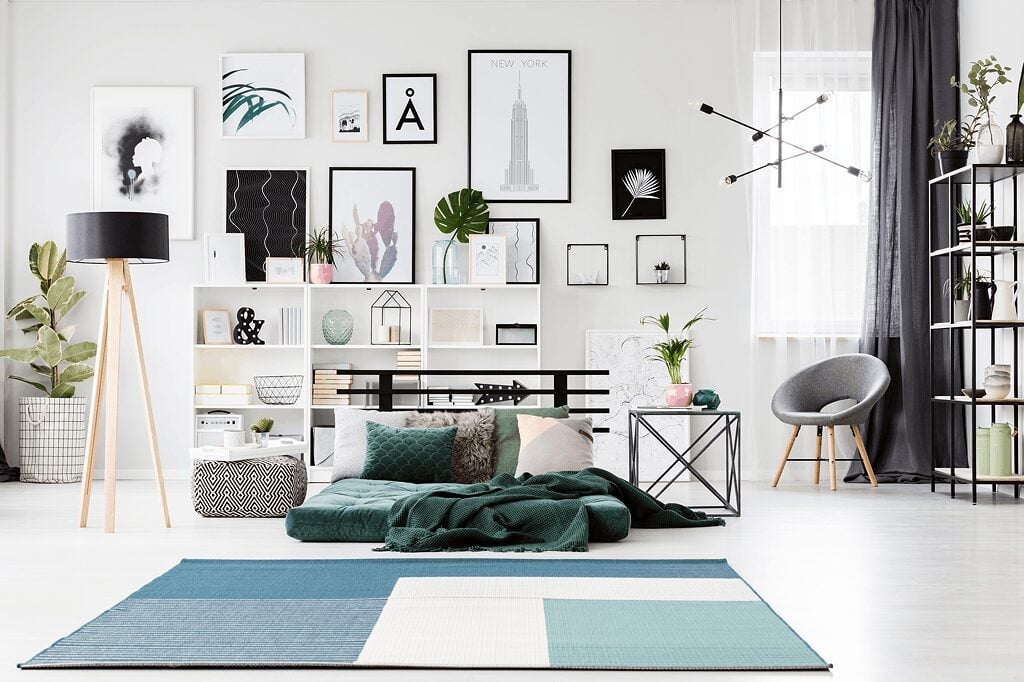 image of modern white and blue bedroom with various indoor plants.